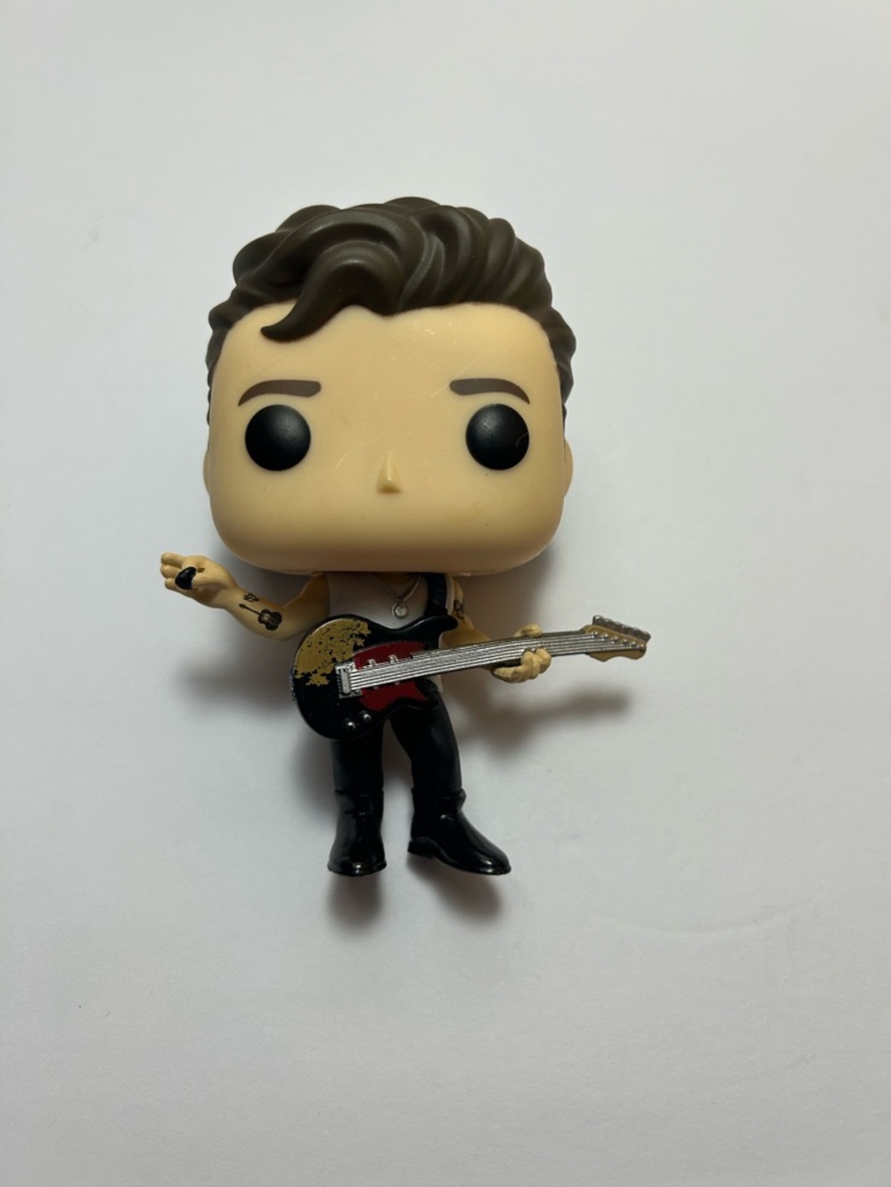 Funko Male Musician Vinyl Figure with Black, Red, Gold Guitar